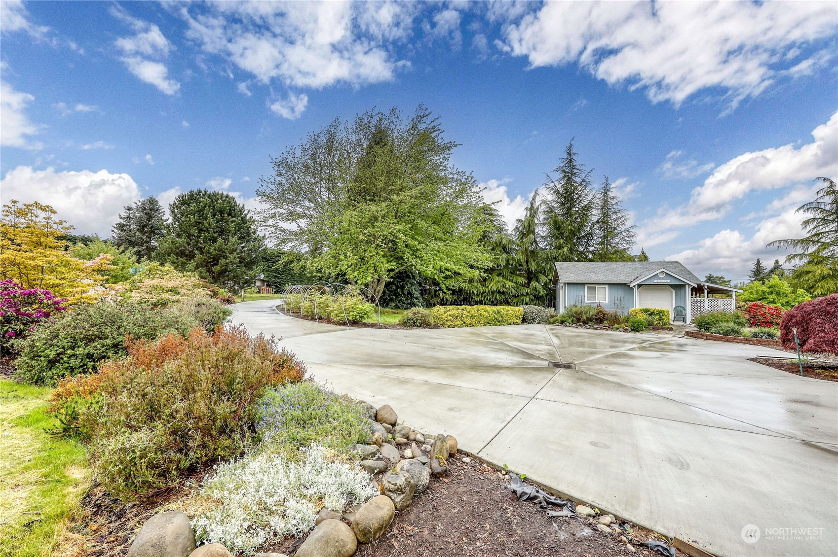 878 North Kendall Road Sequim, WA 98382 - Photo 4 of 30 a view of a house with a yard and pathway