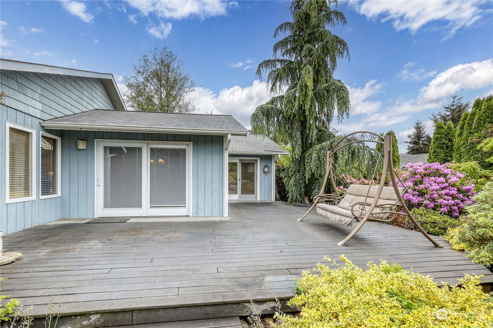 878 North Kendall Road Sequim, WA 98382 - Photo 6 of 30 a front view of a house with garden