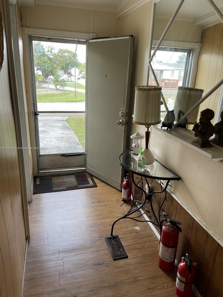 11866 North Branch Road Boca Raton, FL 33428 - Photo 6 of 6 a room with furniture and a window