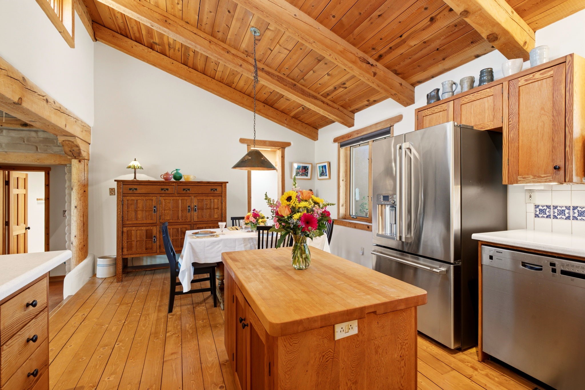 22 Mimosa Road Santa Fe, NM 87508 - Photo 9 of 51 Butcher block island, vaulted ceilings in kitchen
