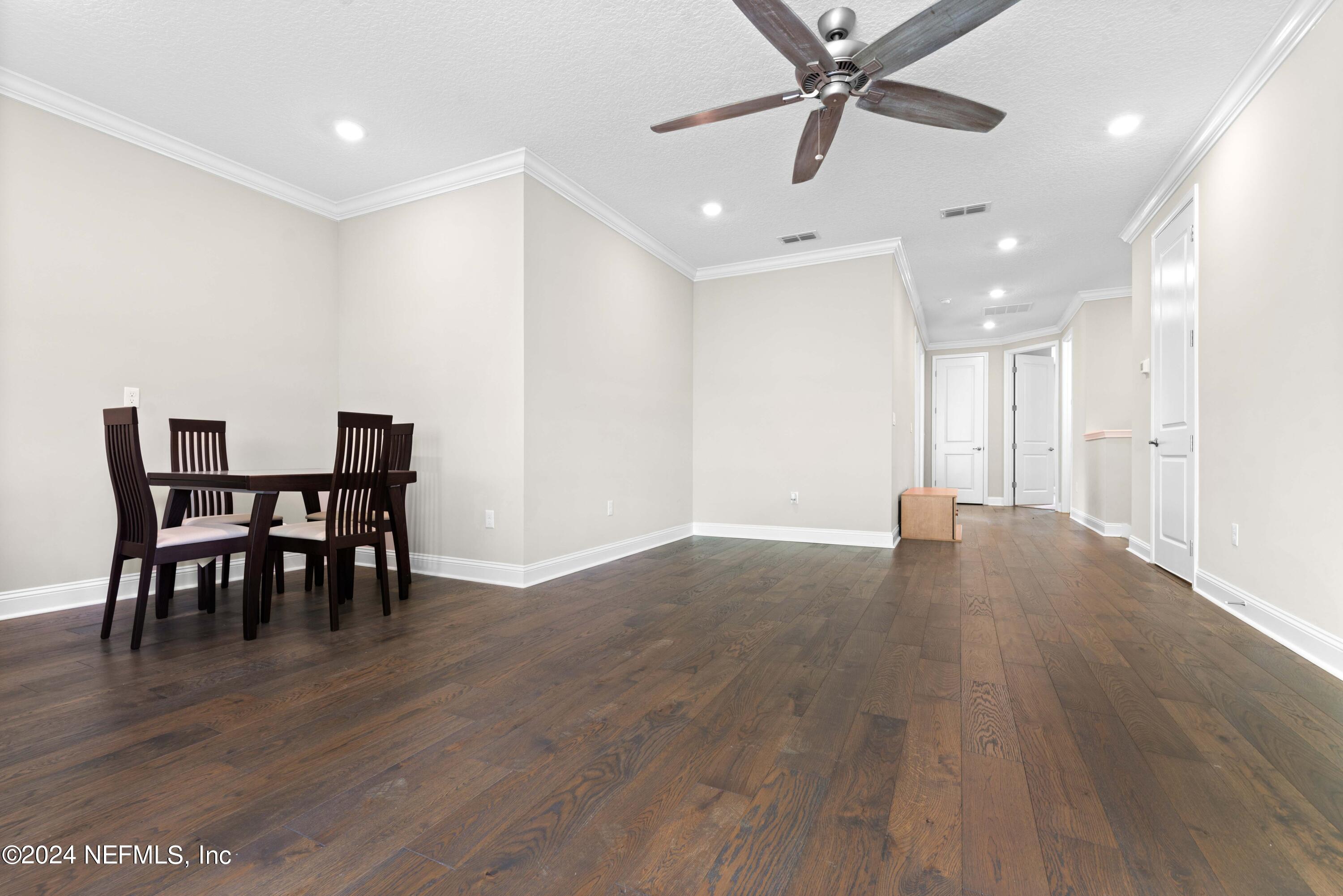1924 Holmes Circle Fleming Island, FL 32003 - Photo 27 of 58 a view of a work space with furniture and wooden floor