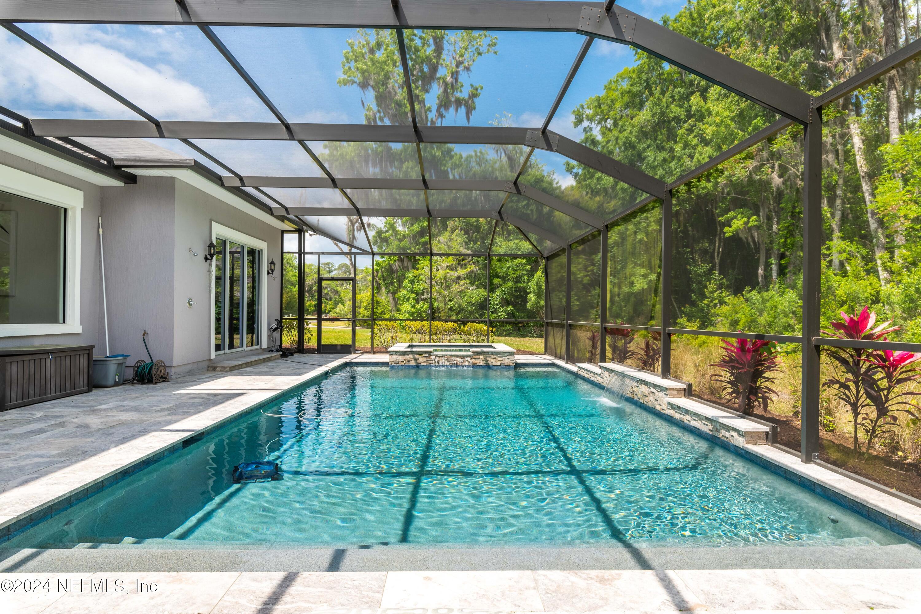 1924 Holmes Circle Fleming Island, FL 32003 - Photo 39 of 58 a swimming pool with a outdoor seating