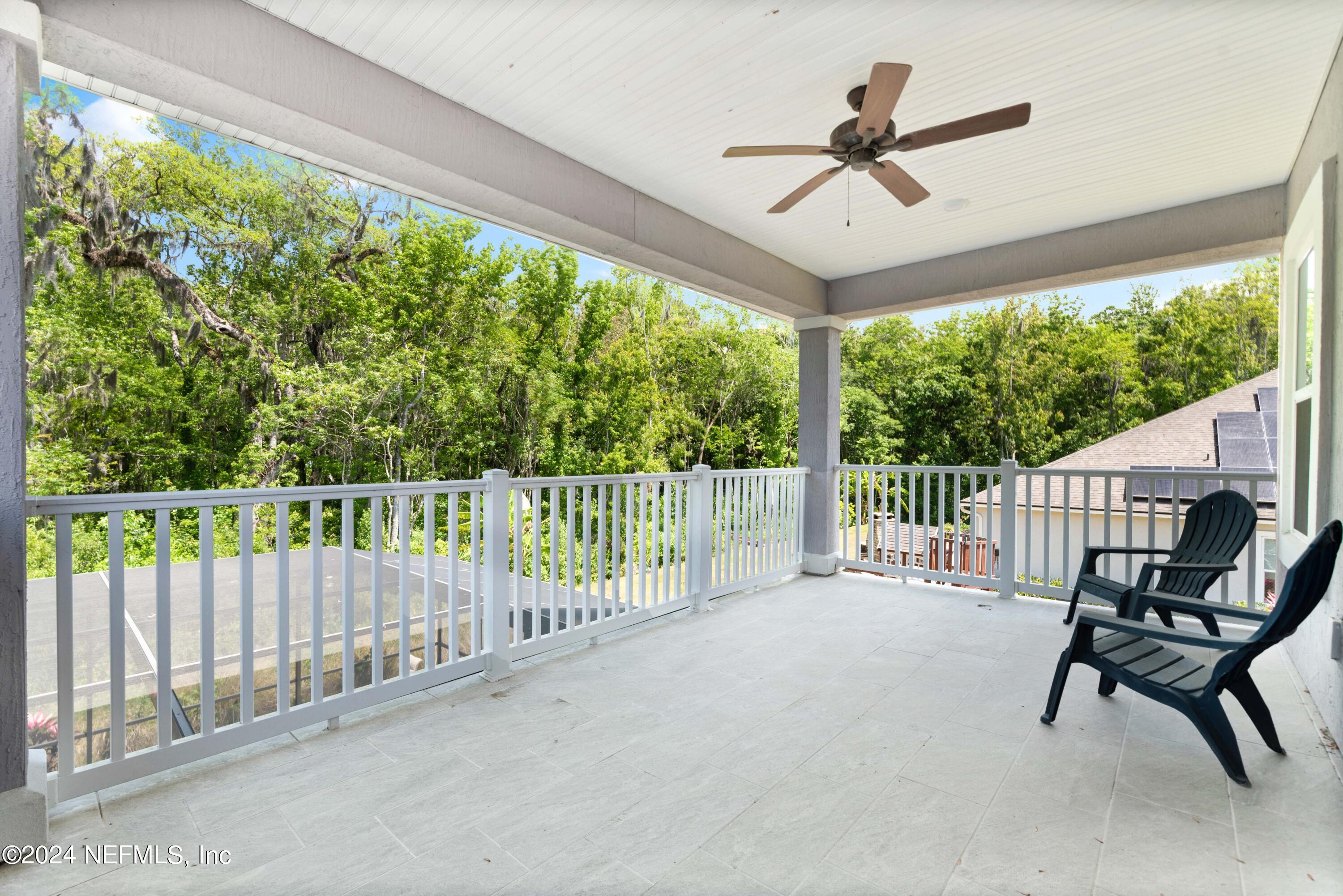 1924 Holmes Circle Fleming Island, FL 32003 - Photo 41 of 58 a view of a porch with furniture