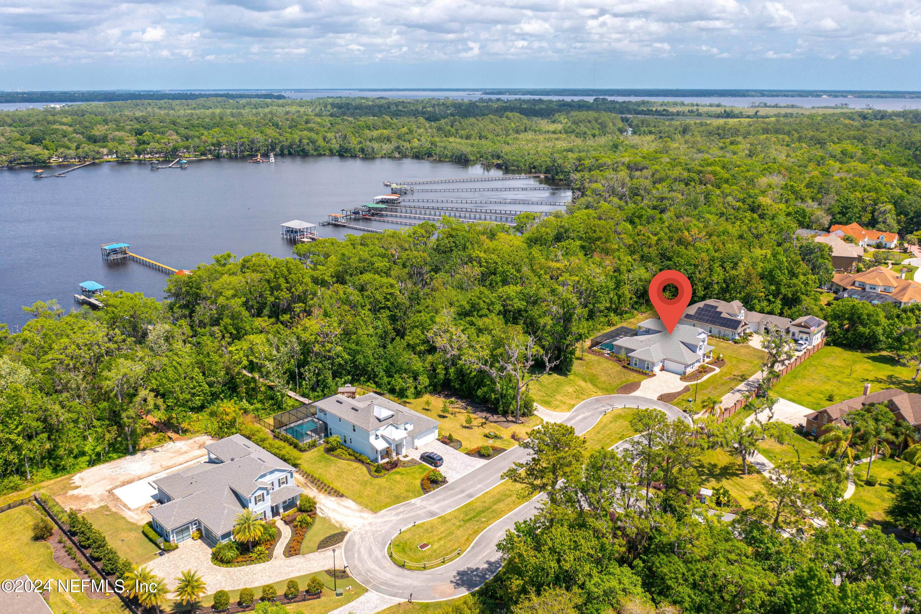 1924 Holmes Circle Fleming Island, FL 32003 - Photo 56 of 58 a aerial view of a house with a lake view