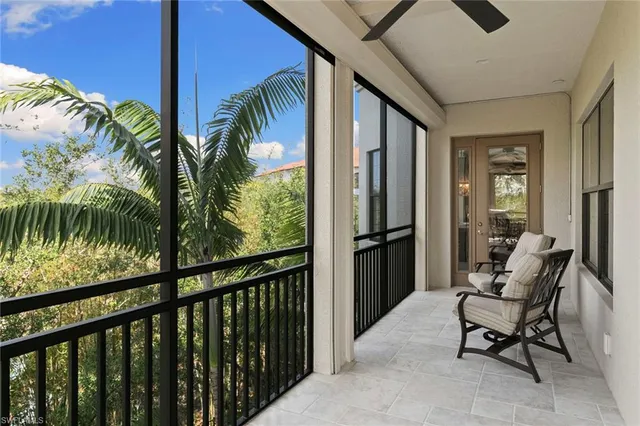 a utility room with cabinets washer and dryer