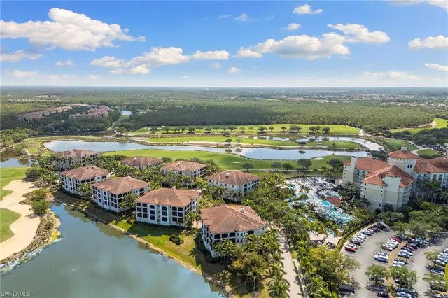 a front view of a residential houses with yard