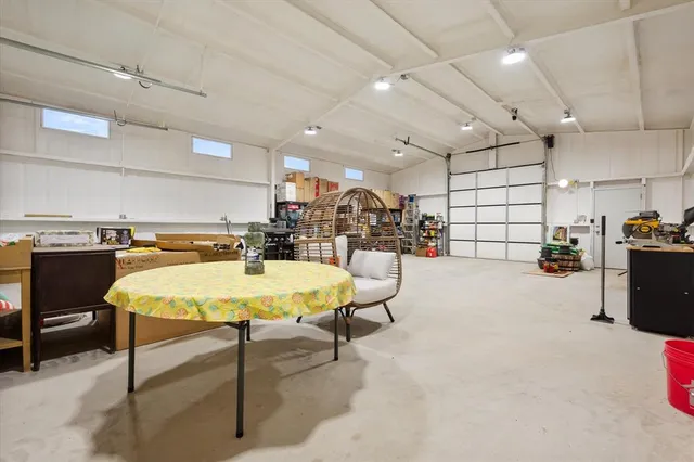 a view of a house with backyard and porch