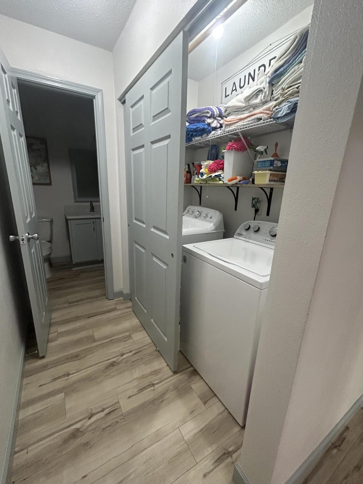 488 Linkside Place West Miramar Beach, FL 32550 - Photo 10 of 20 a utility room with dryer and washer