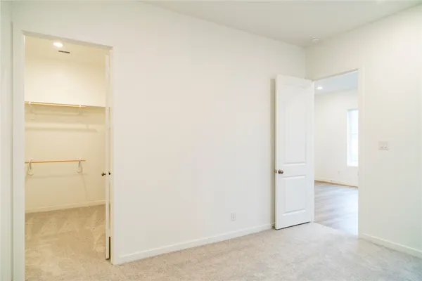 a bathroom with a sink a toilet and vanity