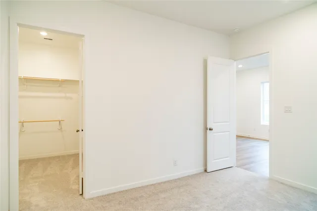 a bathroom with a sink a toilet and vanity