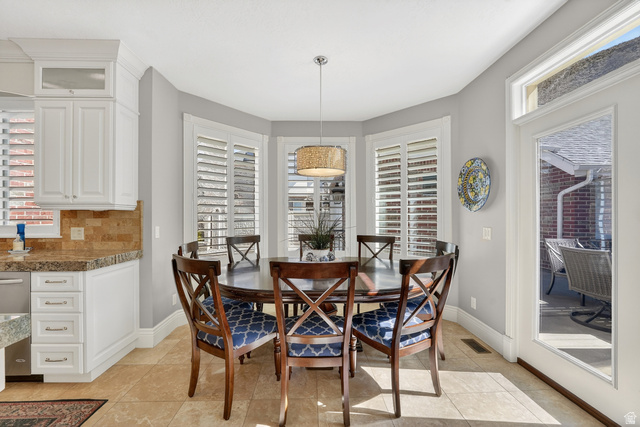 714 Draper Heights Way Draper, UT 84020 - Photo 17 of 88 Dining area with plenty of natural light and light tile patterned flooring