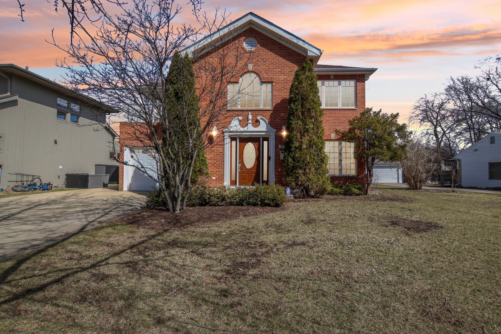 1115 Whitfield Road Northbrook, IL 60062 - Photo 2 of 54 a front view of a house with a yard