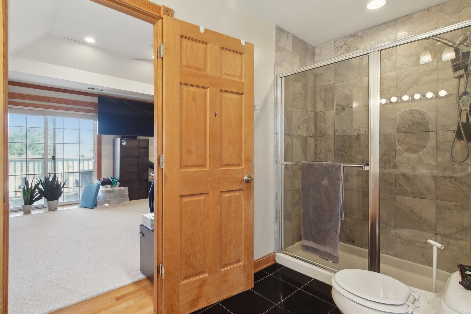 1115 Whitfield Road Northbrook, IL 60062 - Photo 25 of 54 a bathroom with a shower and toilet