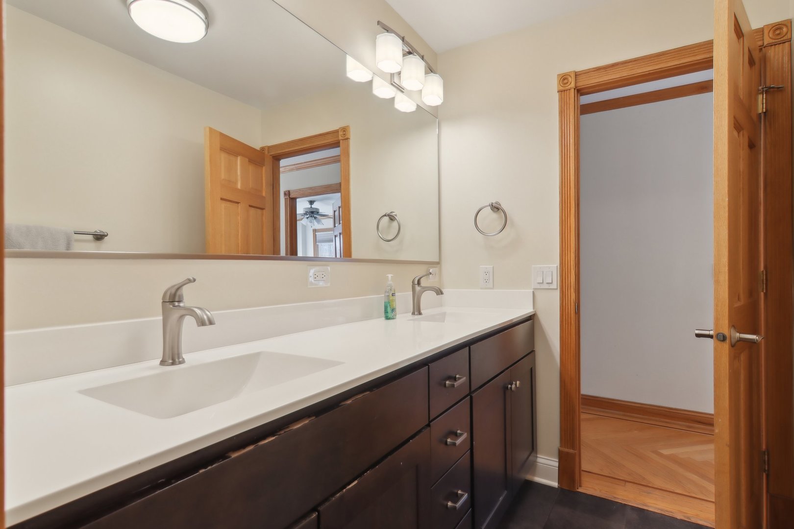 1115 Whitfield Road Northbrook, IL 60062 - Photo 32 of 54 a bathroom with a sink and a mirror