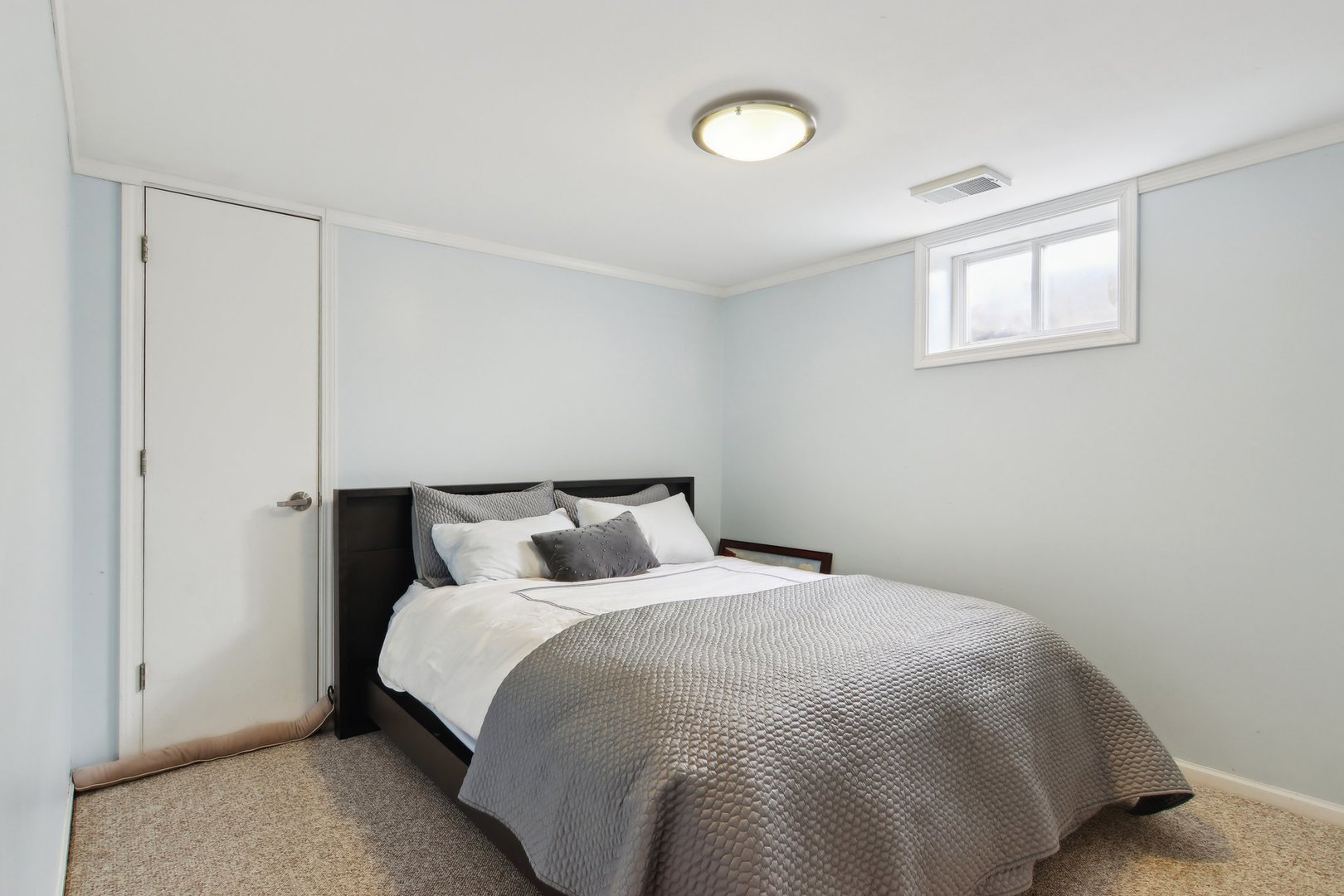 1115 Whitfield Road Northbrook, IL 60062 - Photo 37 of 54 a bedroom with a bed and a night stand