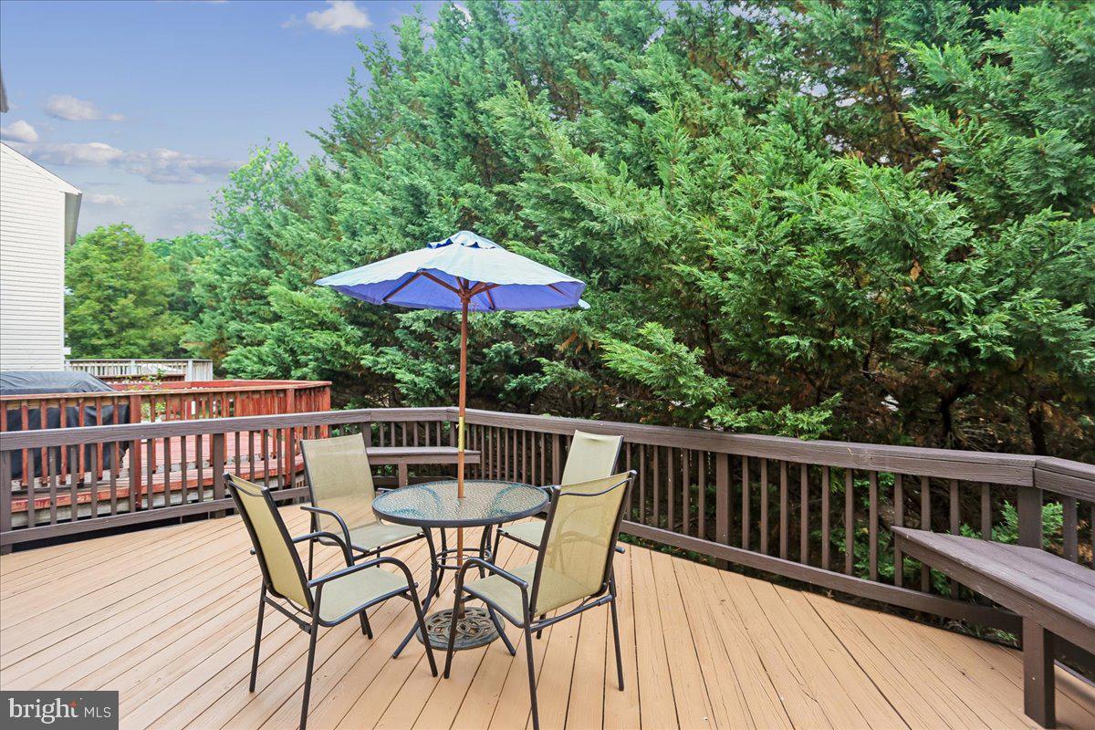 2943 St Helen Circle Silver Spring, MD 20906 - Photo 37 of 40 Serene deck retreat surrounded by greenery.
