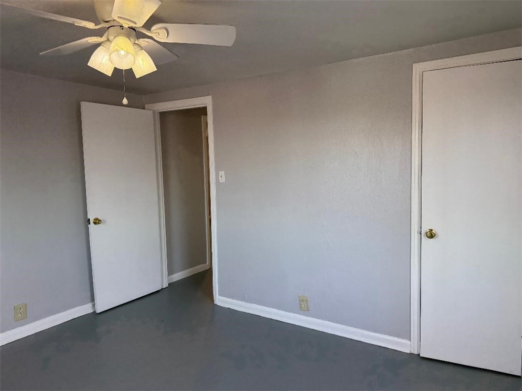 810 8th Avenue Portland, TX 78374 - Photo 14 of 16 a view of an empty room and chandelier fan
