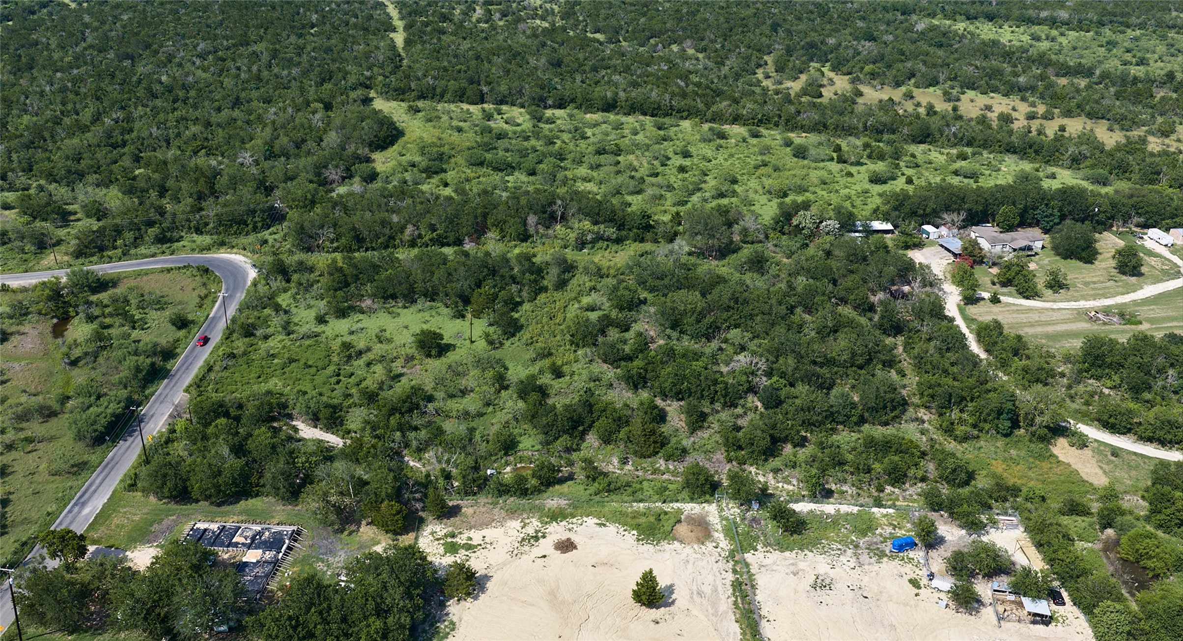 1400 Williamson Road Kyle, TX 78640 - Photo 10 of 13 Vast natural landscape provides a prime opportunity for a new residential development.