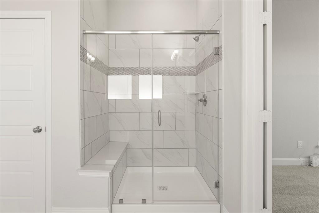 395 Misty Meadow Lane Lavon, TX 75166 - Photo 13 of 24 a bathroom with a shower