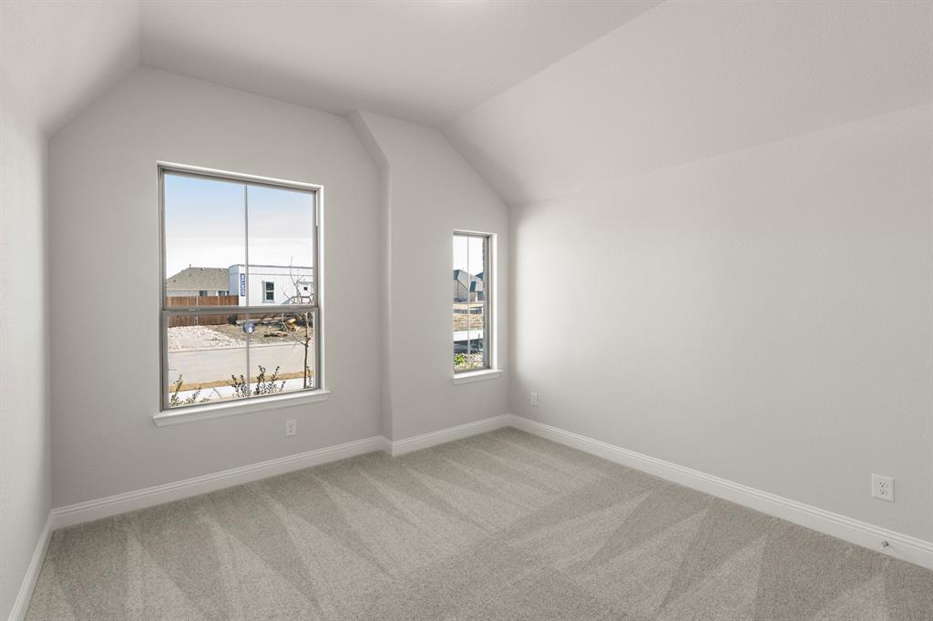395 Misty Meadow Lane Lavon, TX 75166 - Photo 16 of 24 an empty room with windows