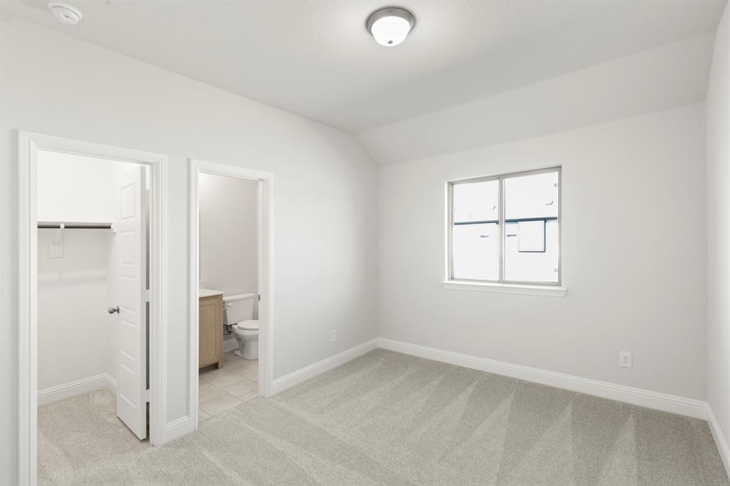 395 Misty Meadow Lane Lavon, TX 75166 - Photo 19 of 24 an empty room with a bathroom
