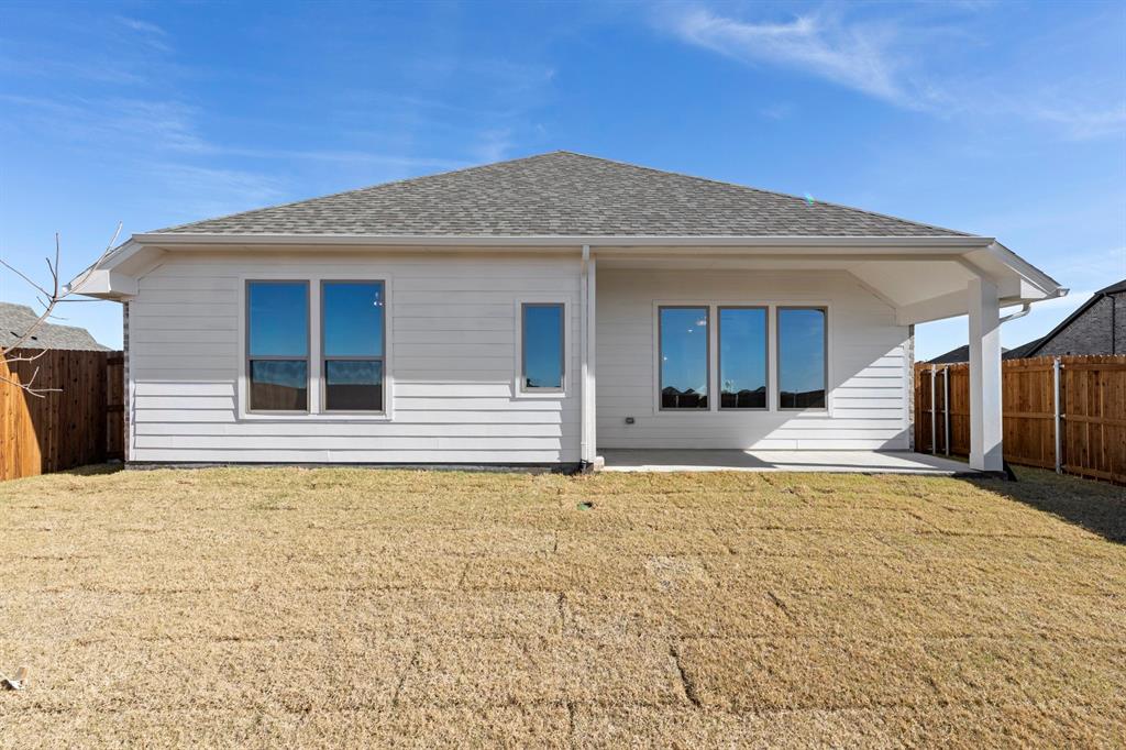 395 Misty Meadow Lane Lavon, TX 75166 - Photo 22 of 24 a view of a house with potted plants in front of door