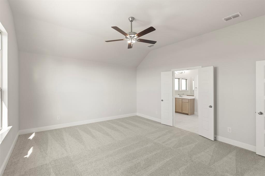 395 Misty Meadow Lane Lavon, TX 75166 - Photo 9 of 24 an empty room with windows and fan