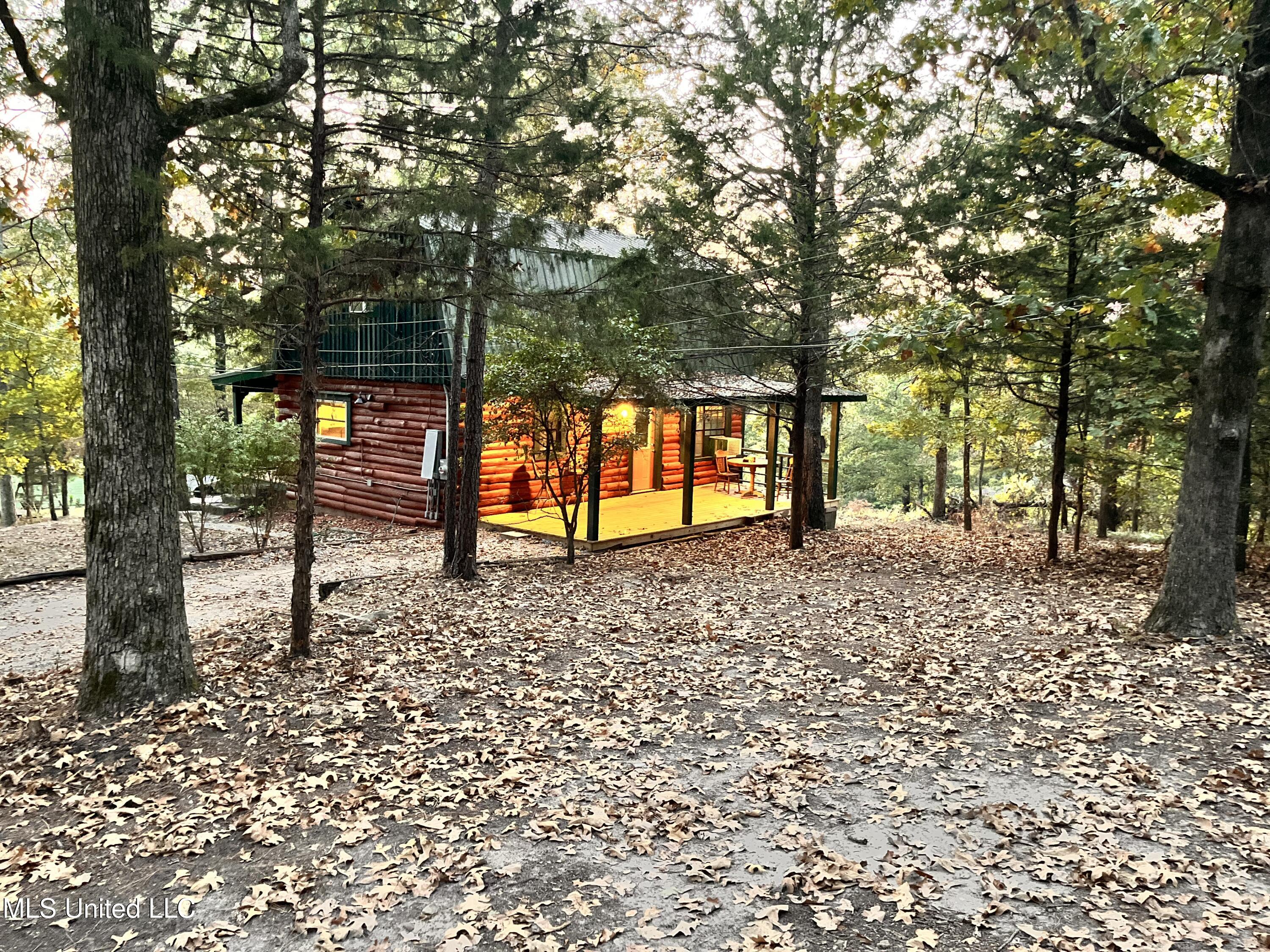 180 Red Oak Road Ashland, MS 38603 - Photo 23 of 25 back porch at dusk