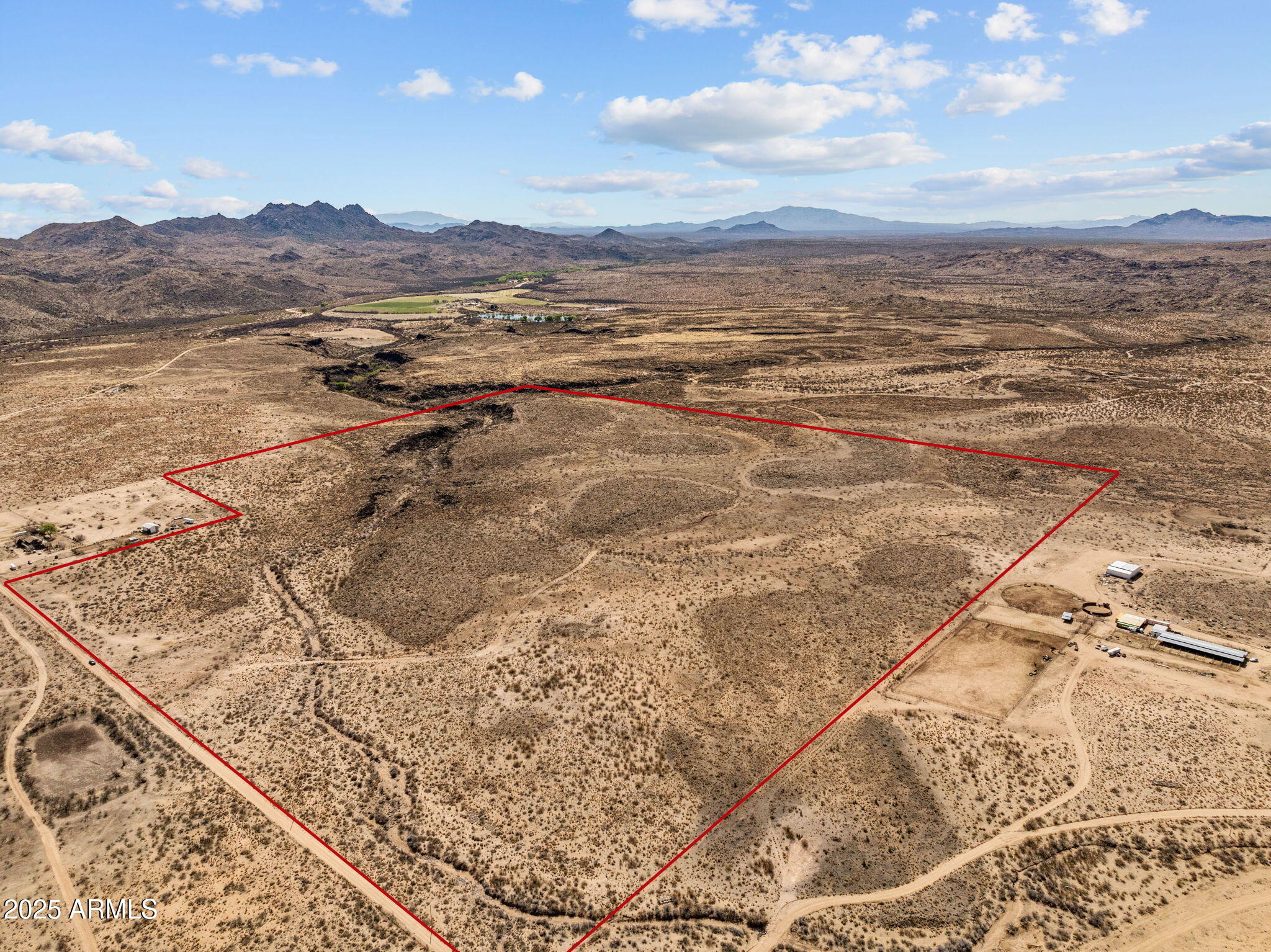 a view of an ocean and a mountain