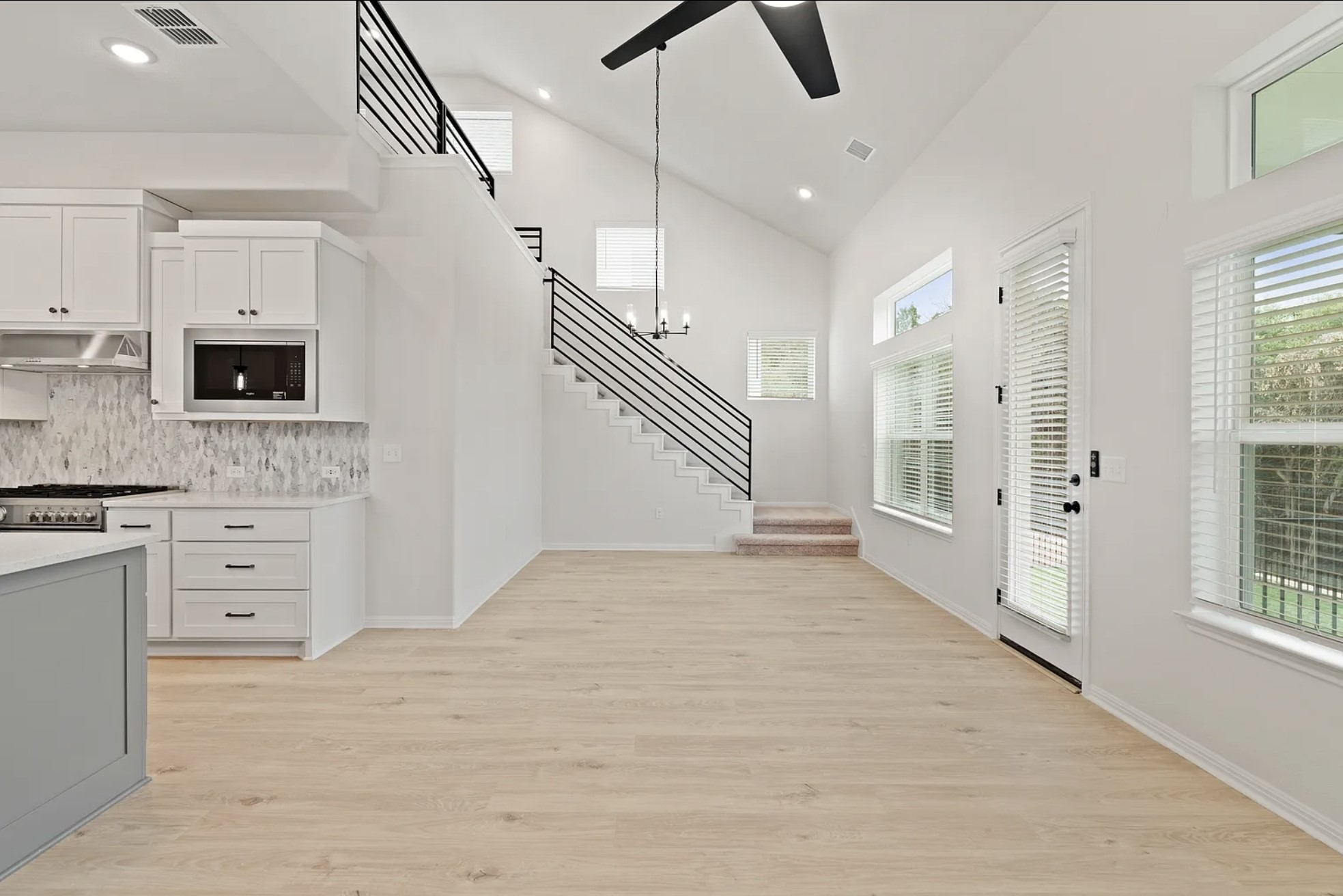 1612 Kit Circle Austin, TX 78758 - Photo 11 of 29 a view of a hallway with kitchen and dining area