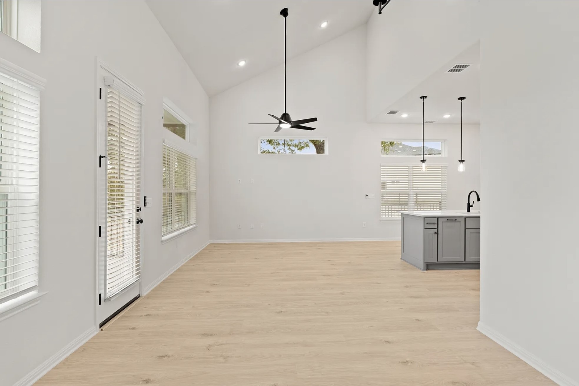 1612 Kit Circle Austin, TX 78758 - Photo 12 of 29 a view of a kitchen with refrigerator and windows