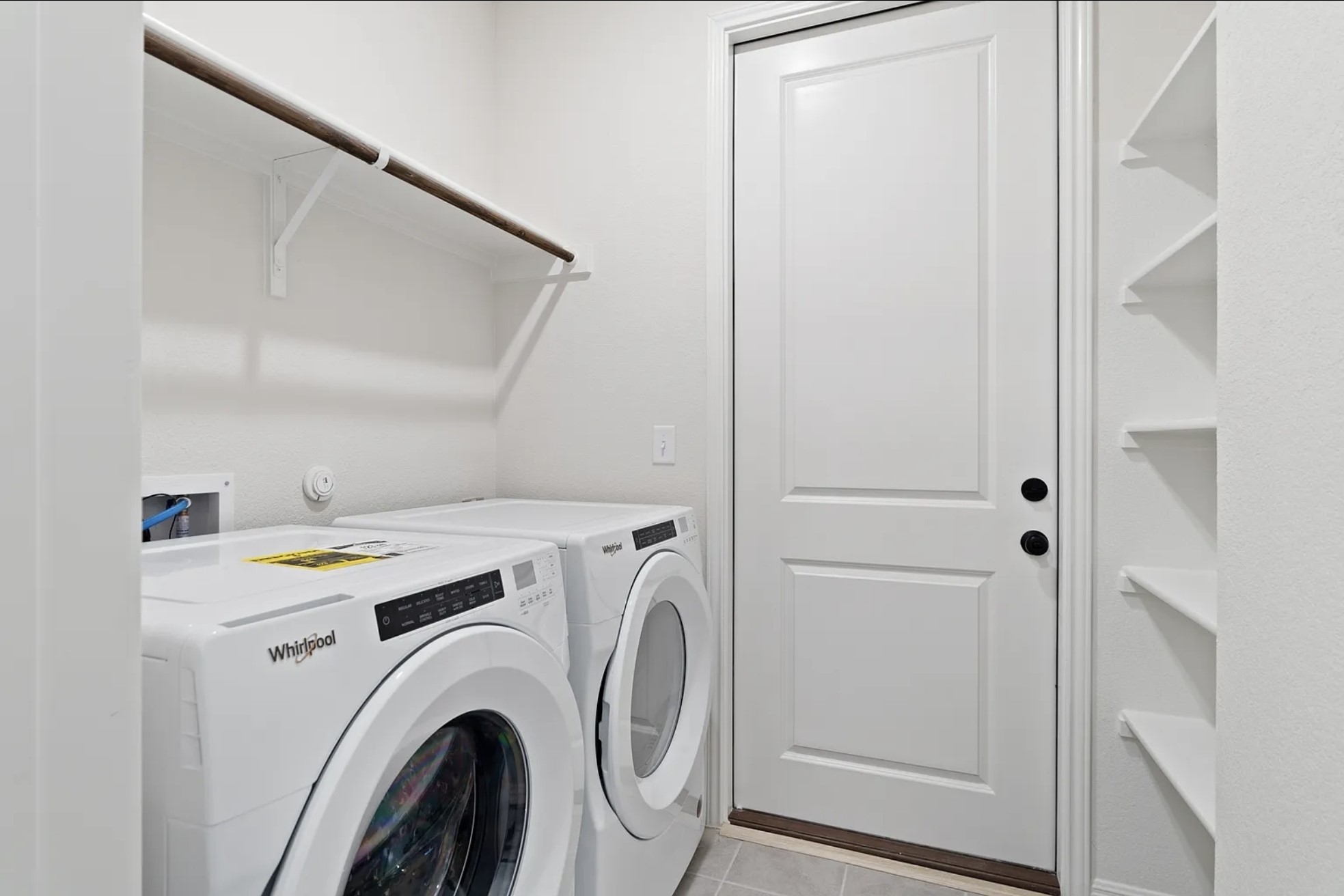 1612 Kit Circle Austin, TX 78758 - Photo 27 of 29 a utility room with dryer and washer