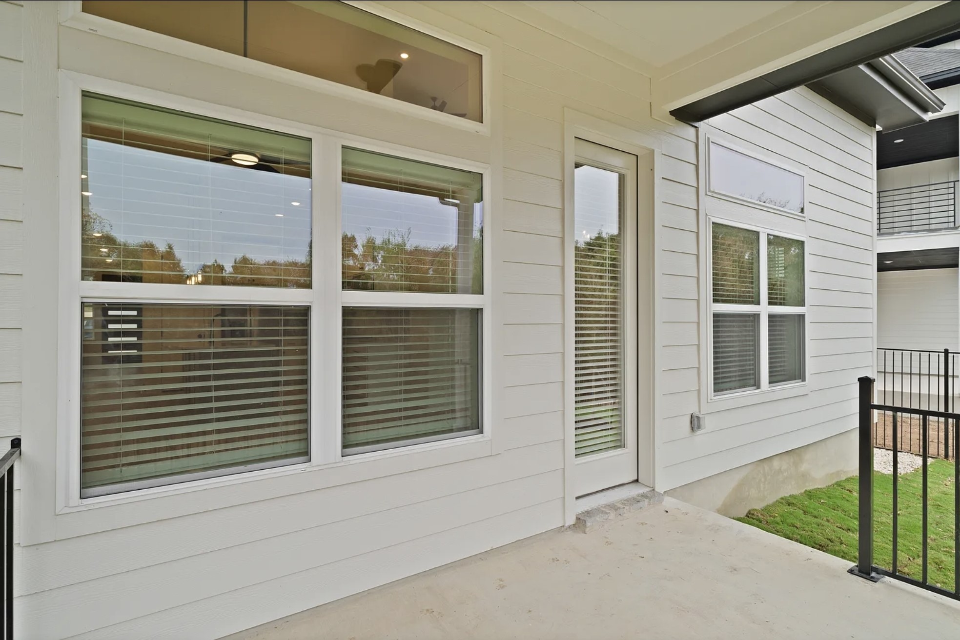 1612 Kit Circle Austin, TX 78758 - Photo 28 of 29 a view of a porch with a door and a window
