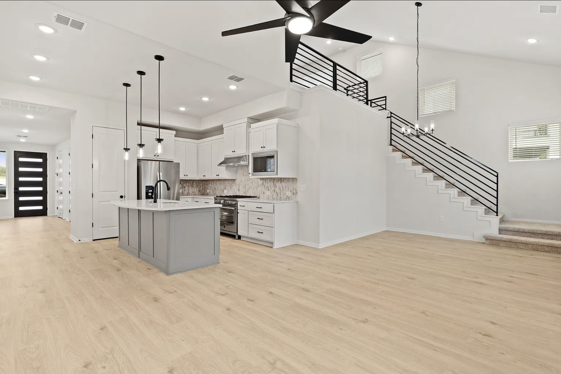 1612 Kit Circle Austin, TX 78758 - Photo 6 of 29 a view of kitchen with stainless steel appliances cabinets a sink and a counter top space