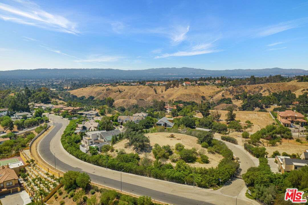 18160 North Knoll Hill Granada Hills, CA 91344 - Photo 1 of 11 an aerial view of residential houses with outdoor space
