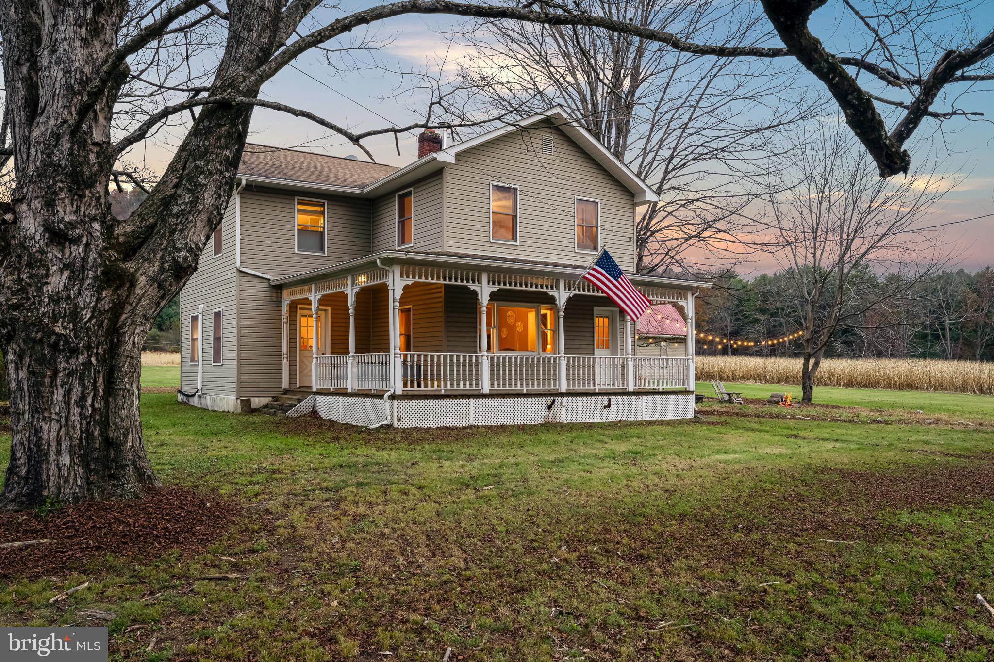 228 Huntington Creek Road Sweet Valley, PA 18656 - Photo 2 of 128 a view of a house with a yard