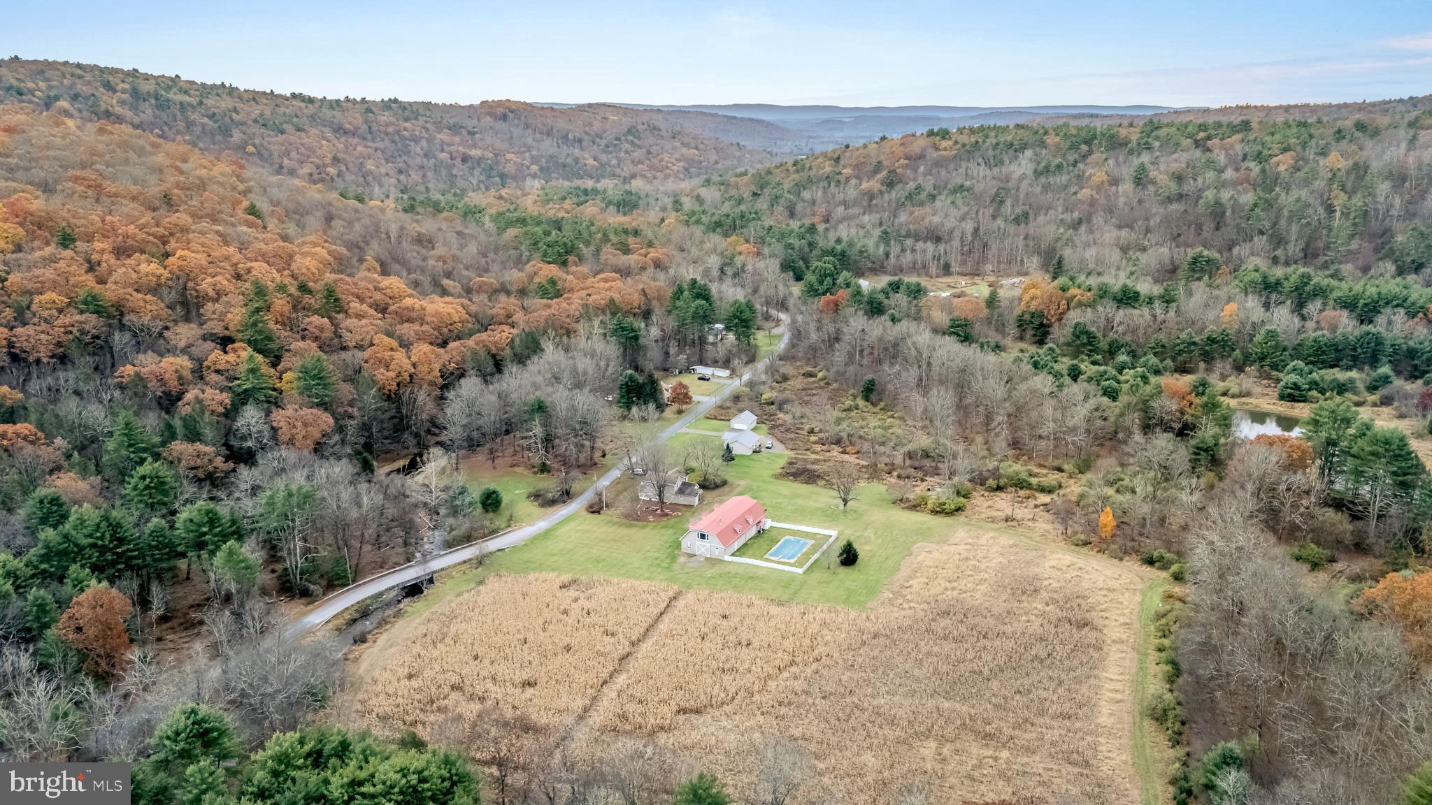 228 Huntington Creek Road Sweet Valley, PA 18656 - Photo 24 of 128 an aerial view of a house with a yard