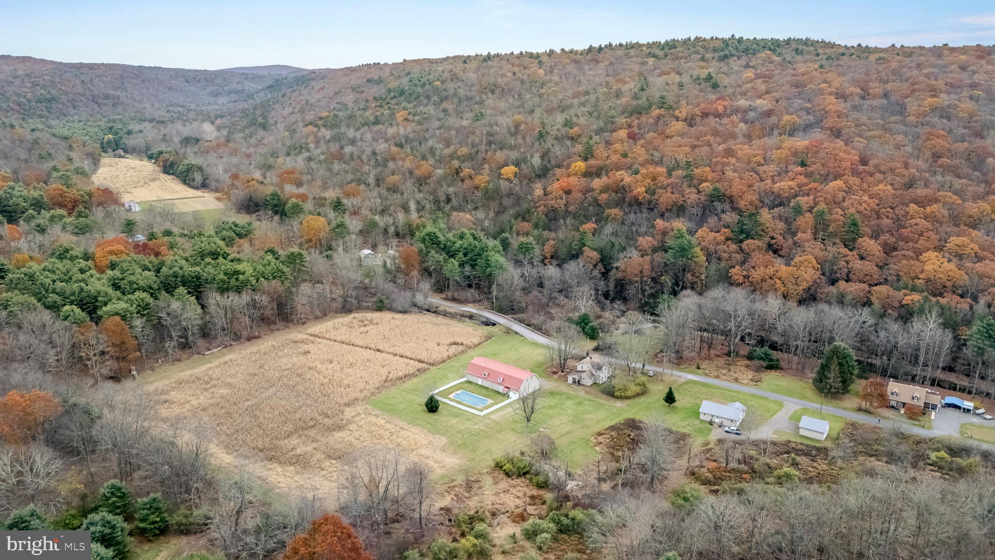 228 Huntington Creek Road Sweet Valley, PA 18656 - Photo 25 of 128 a view of a backyard with green space