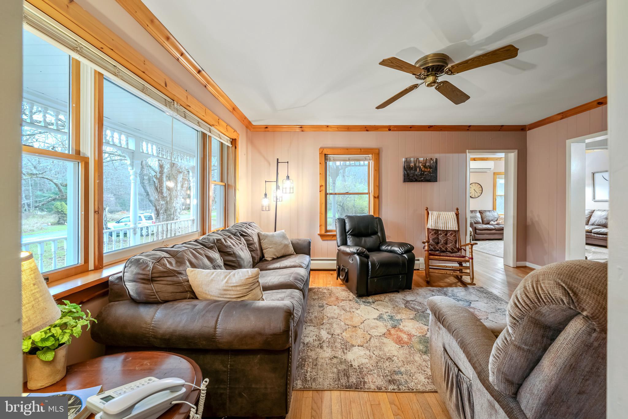 228 Huntington Creek Road Sweet Valley, PA 18656 - Photo 27 of 128 a living room with furniture and a large window