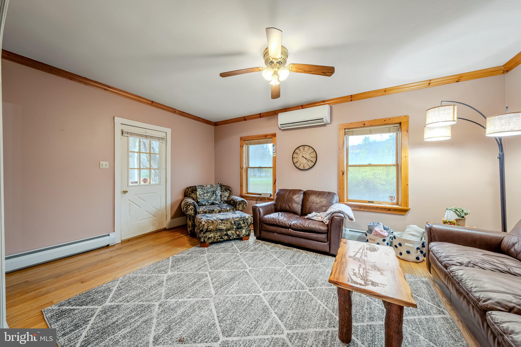 228 Huntington Creek Road Sweet Valley, PA 18656 - Photo 32 of 128 a living room with furniture and a large window