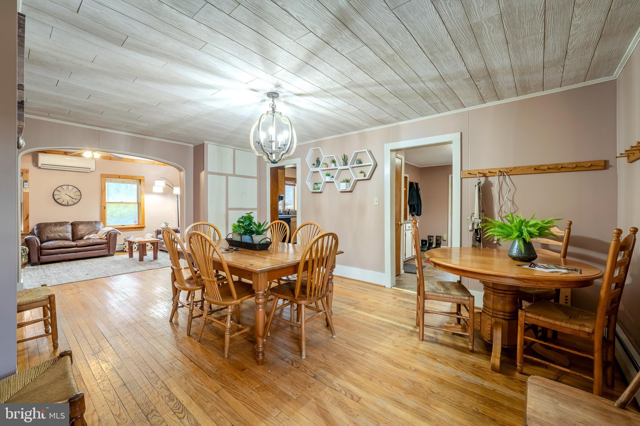 228 Huntington Creek Road Sweet Valley, PA 18656 - Photo 36 of 128 a view of a dining room with furniture window and wooden floor