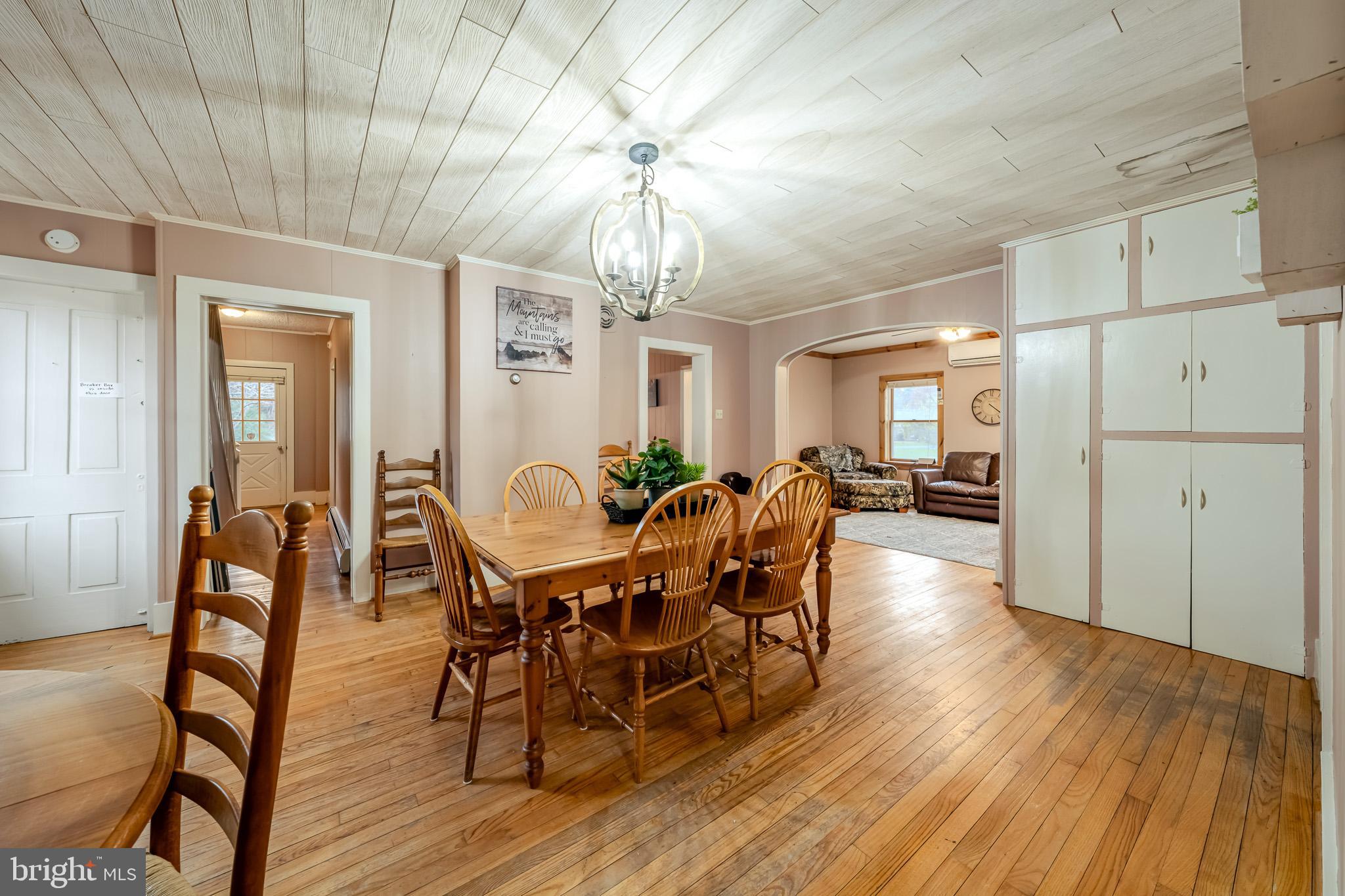 228 Huntington Creek Road Sweet Valley, PA 18656 - Photo 37 of 128 a view of a a dining room with furniture window and wooden floor