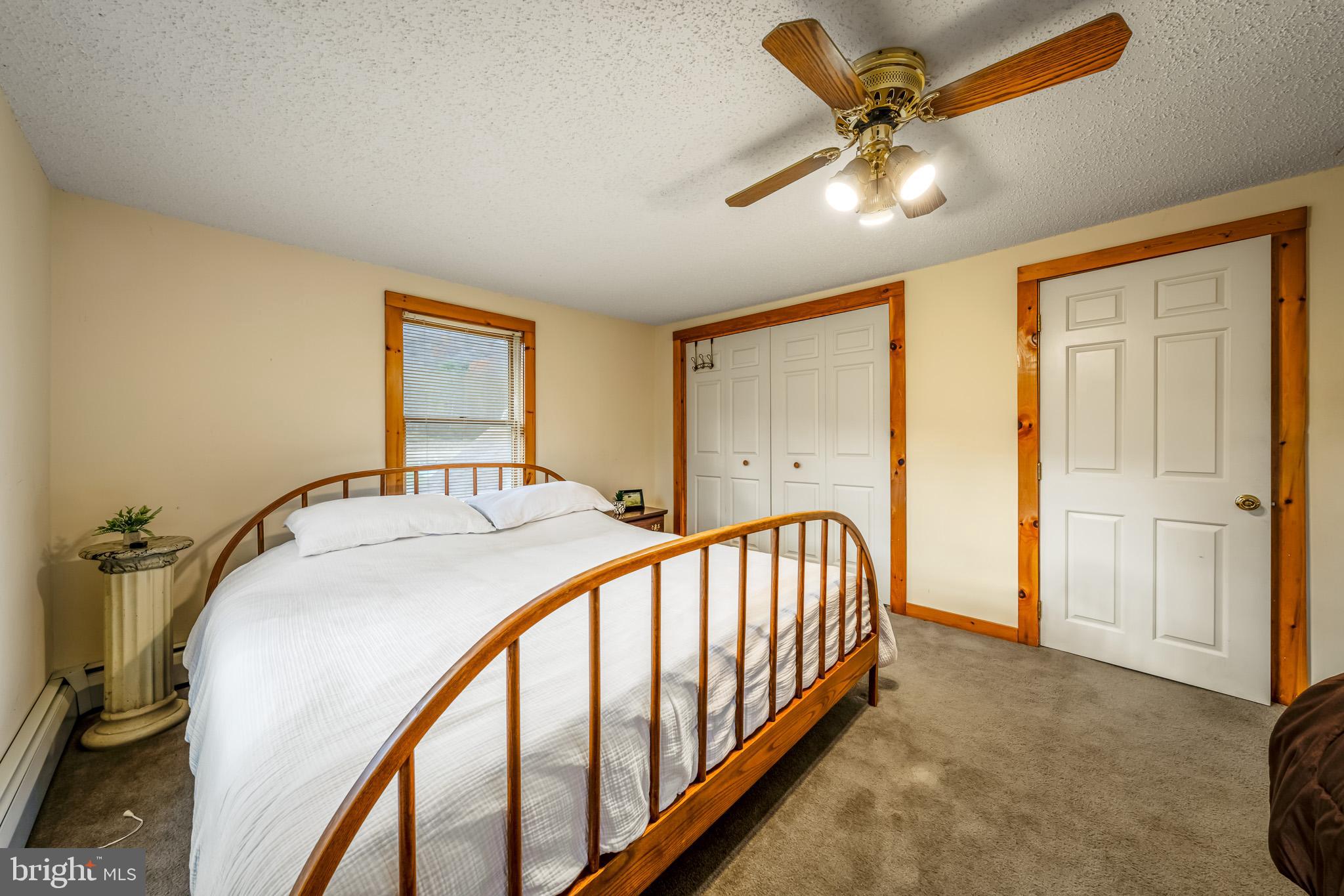 228 Huntington Creek Road Sweet Valley, PA 18656 - Photo 49 of 128 a view of a bedroom with wooden floor