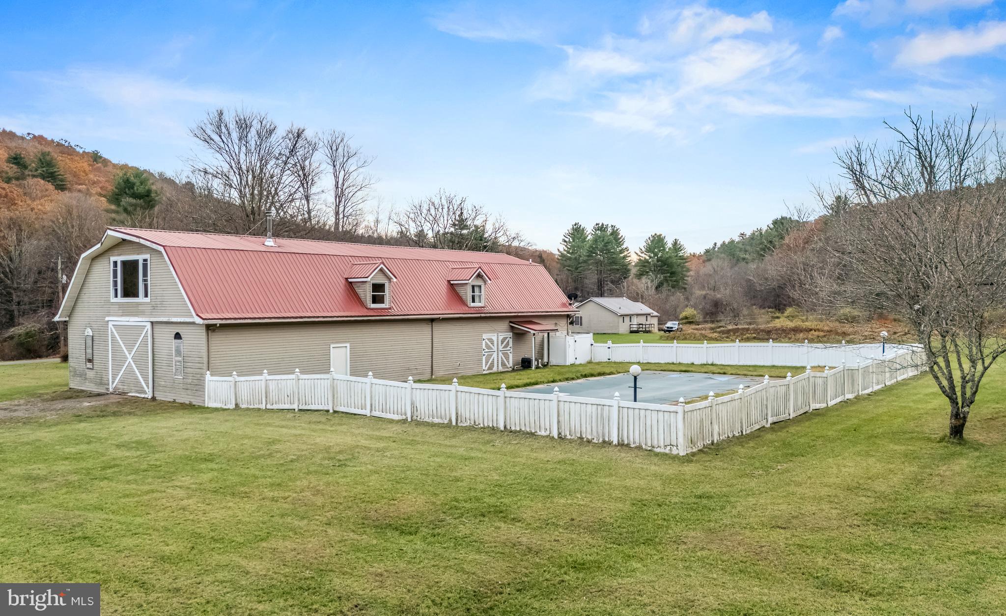 228 Huntington Creek Road Sweet Valley, PA 18656 - Photo 66 of 128 a view of a house with a big yard