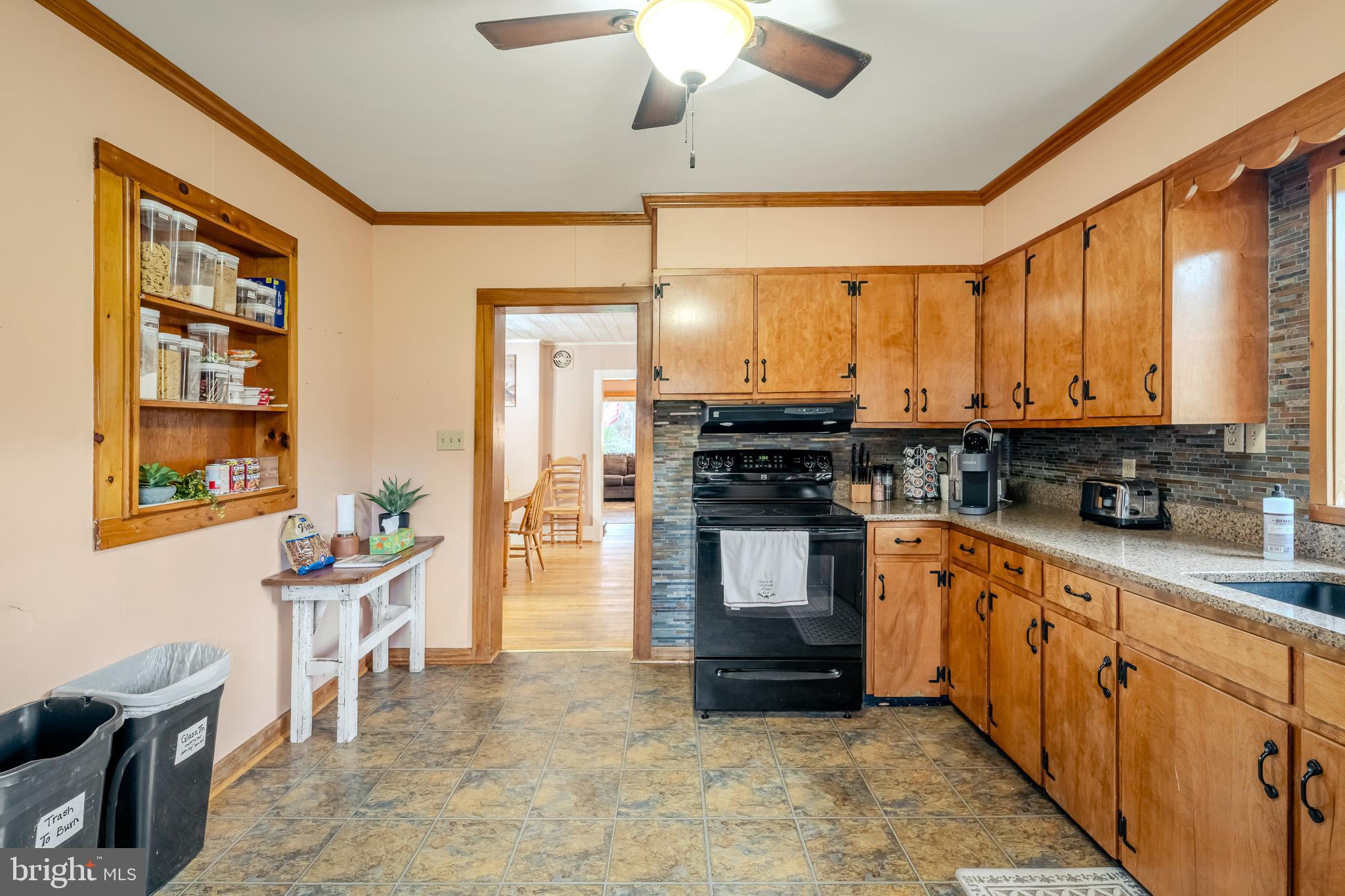 228 Huntington Creek Road Sweet Valley, PA 18656 - Photo 69 of 128 a kitchen with stainless steel appliances a stove sink and cabinets