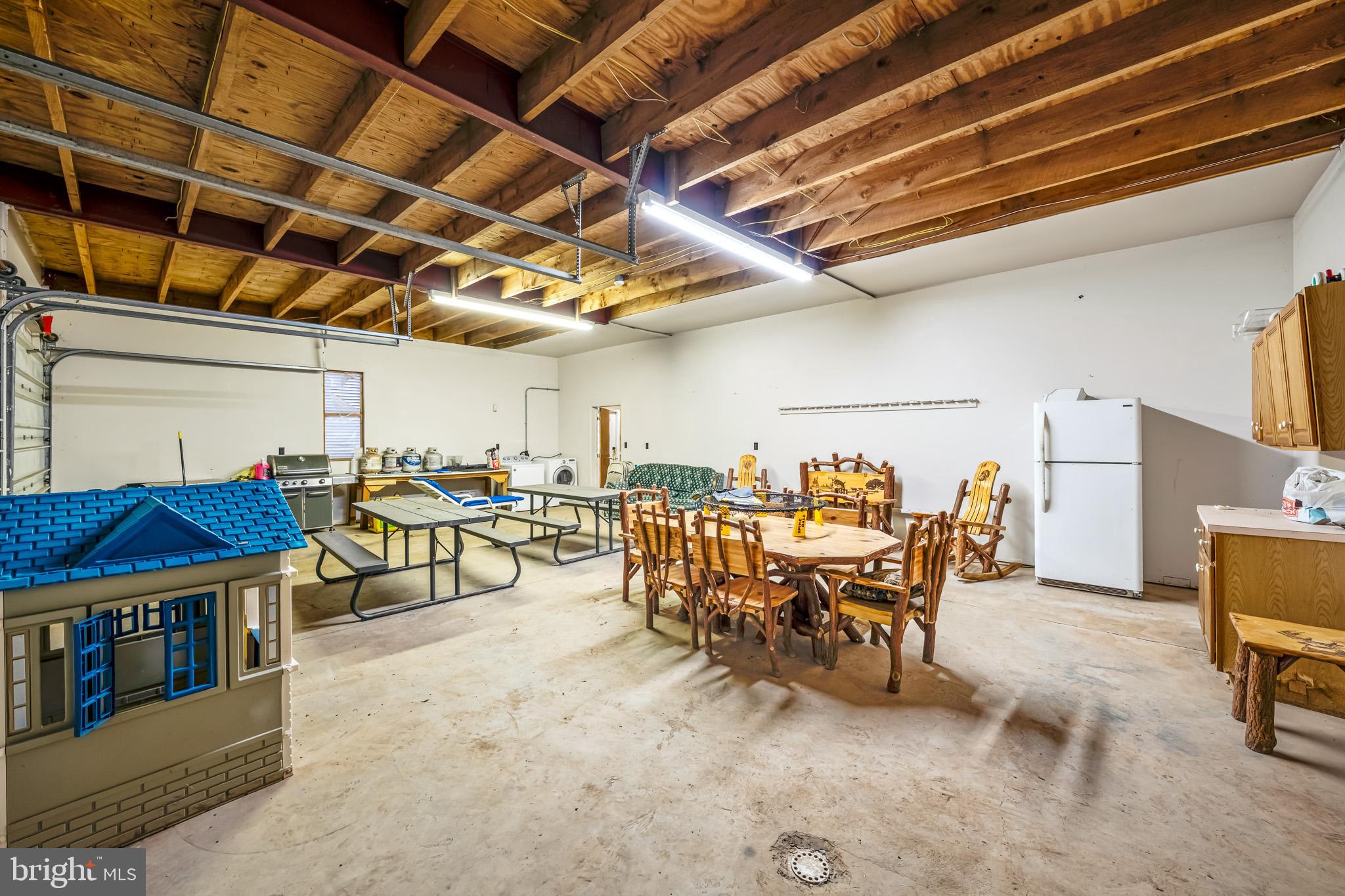 228 Huntington Creek Road Sweet Valley, PA 18656 - Photo 72 of 128 a view of a big room with gym equipment