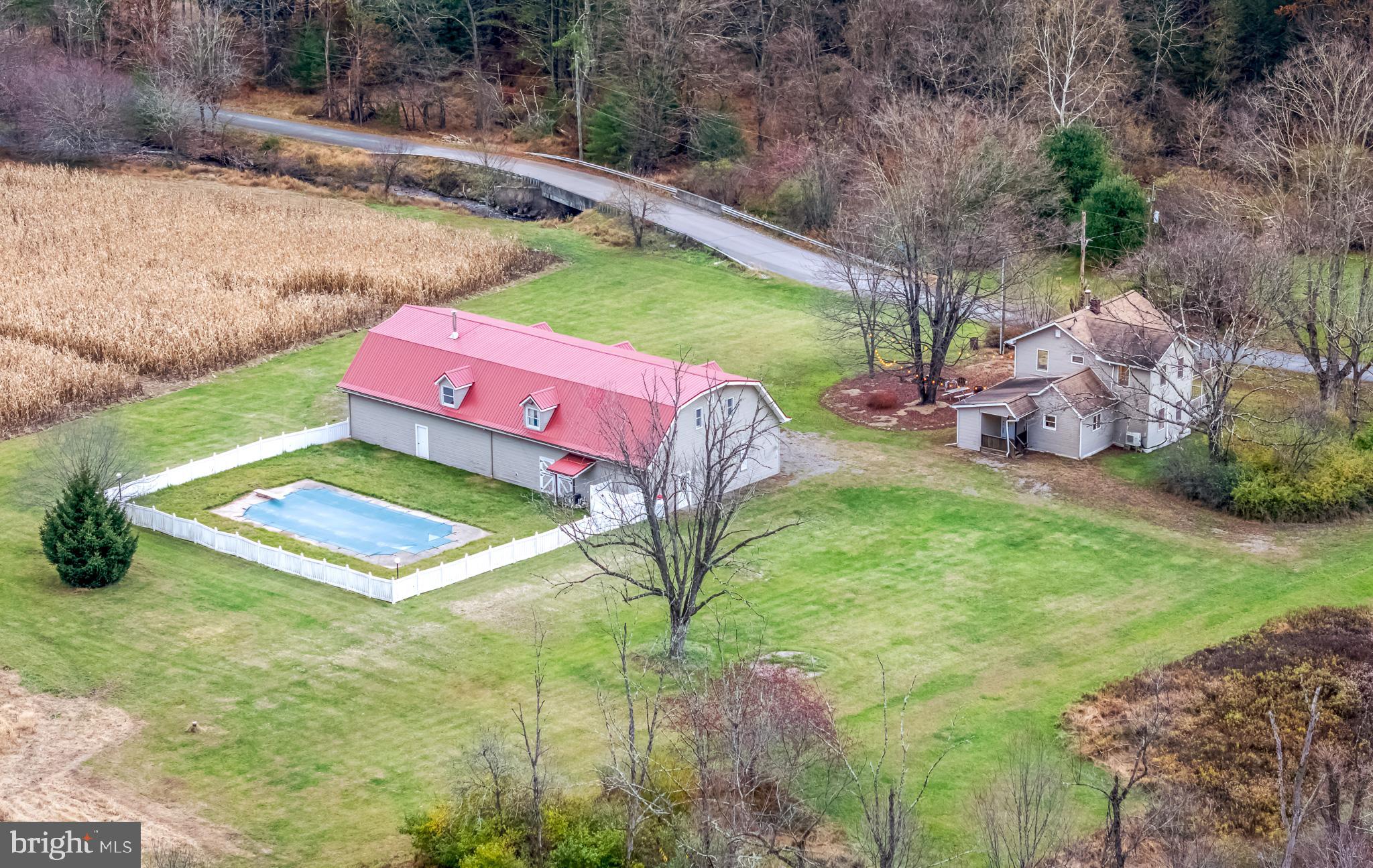 228 Huntington Creek Road Sweet Valley, PA 18656 - Photo 8 of 128 a view of a backyard with plants