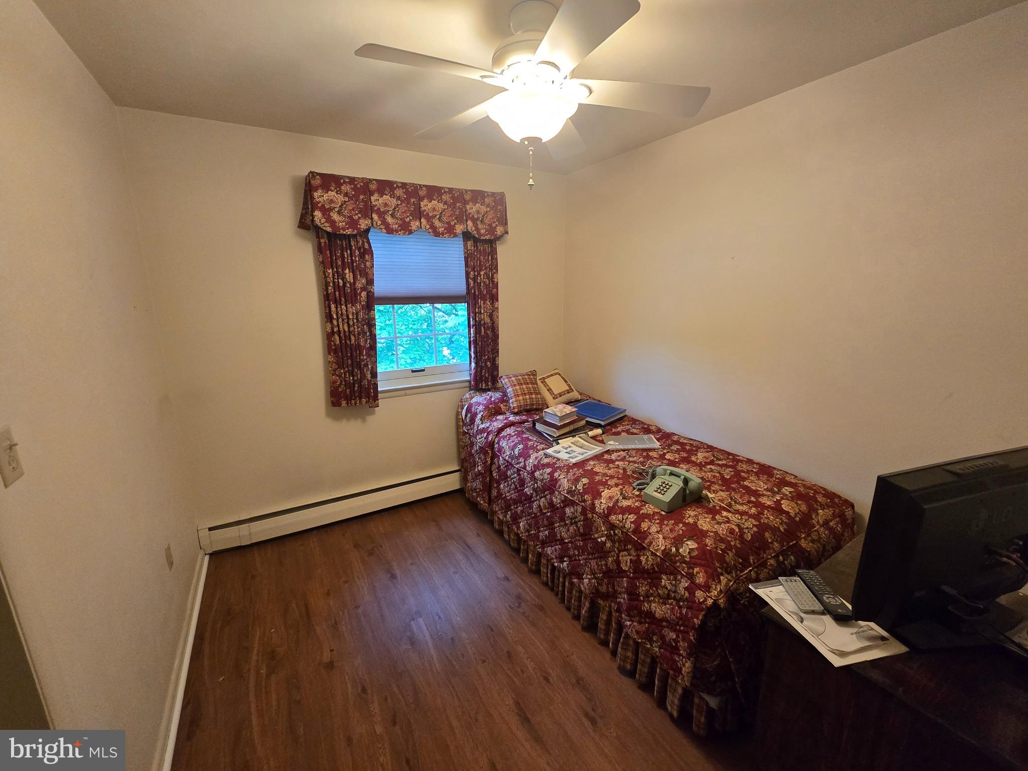 802 Sunset Avenue Gettysburg, PA 17325 - Photo 12 of 19 a bedroom with bed and window