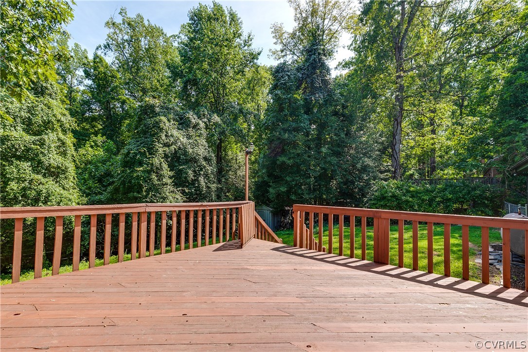 3911 Arklow Road Richmond, VA 23235 - Photo 31 of 39 a view of a wooden roof deck