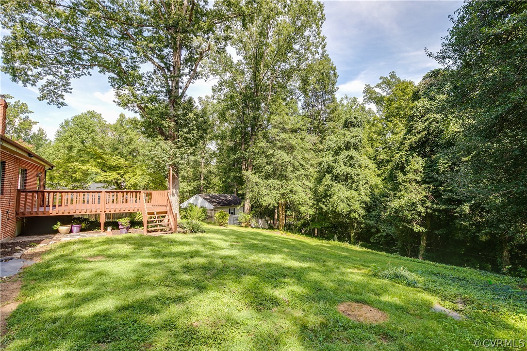 3911 Arklow Road Richmond, VA 23235 - Photo 33 of 39 a view of a house with a yard and sitting area